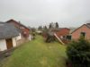 Blick Spielplatz zum Haus